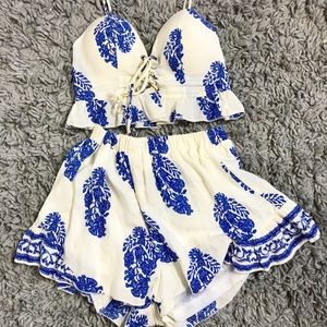 A two piece white and blue set.
